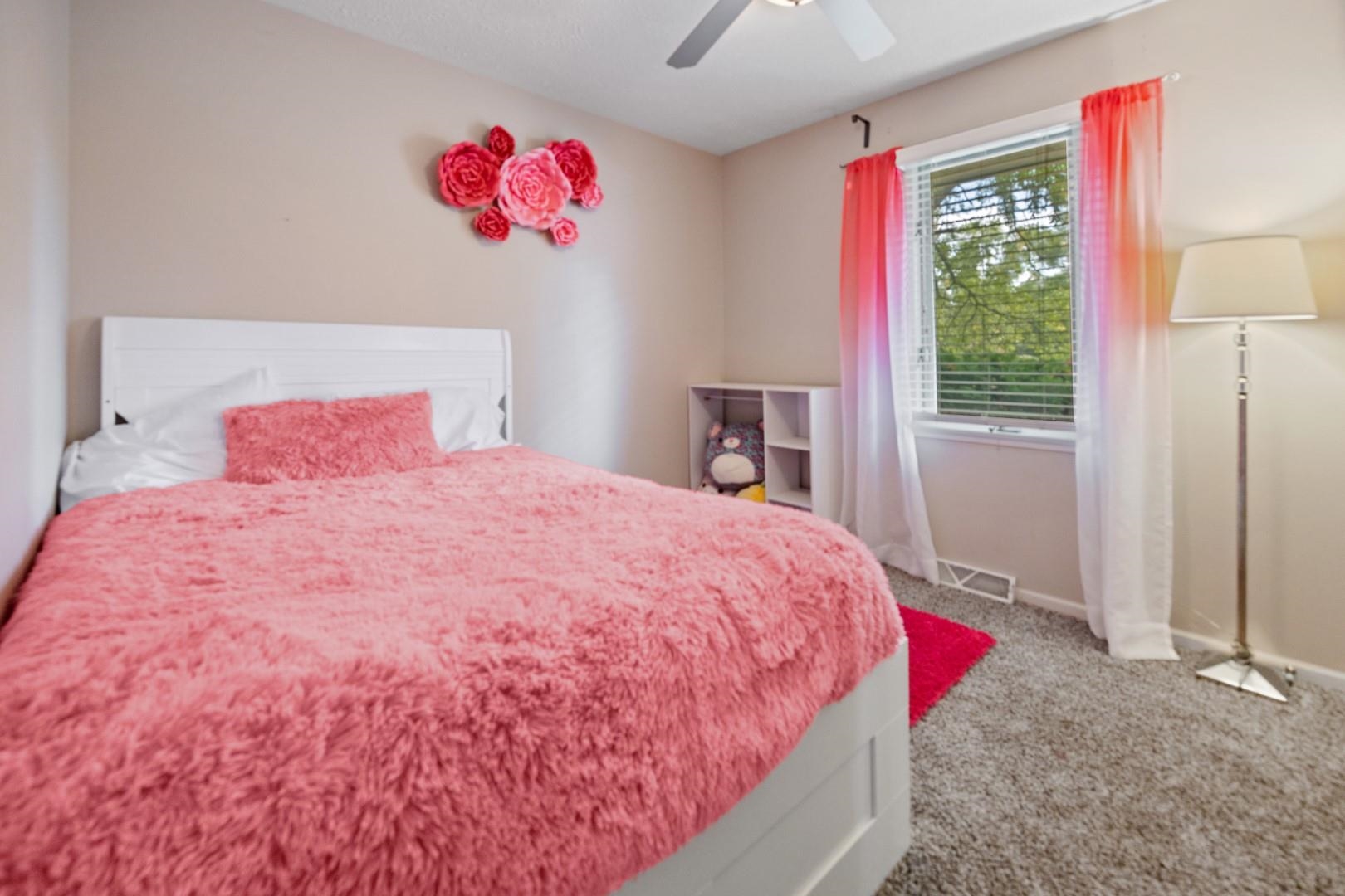 5568 Gray Eagle Road Roscoe, IL 61073 - Photo 22 of 45 a bedroom with a bed and a window