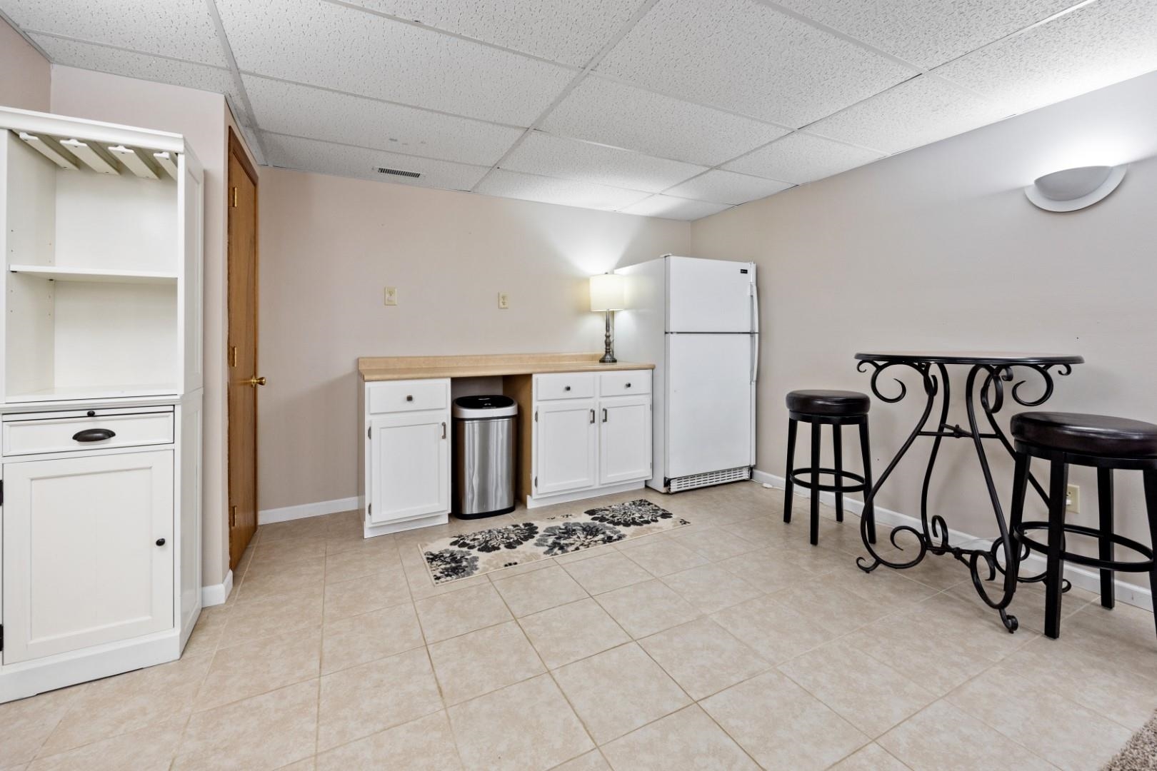 5568 Gray Eagle Road Roscoe, IL 61073 - Photo 31 of 45 a view of a room with gym equipment