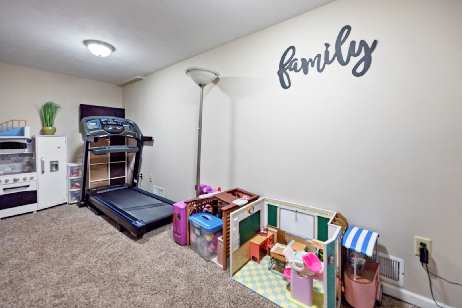 5568 Gray Eagle Road Roscoe, IL 61073 - Photo 32 of 45 a bedroom with furniture and a window