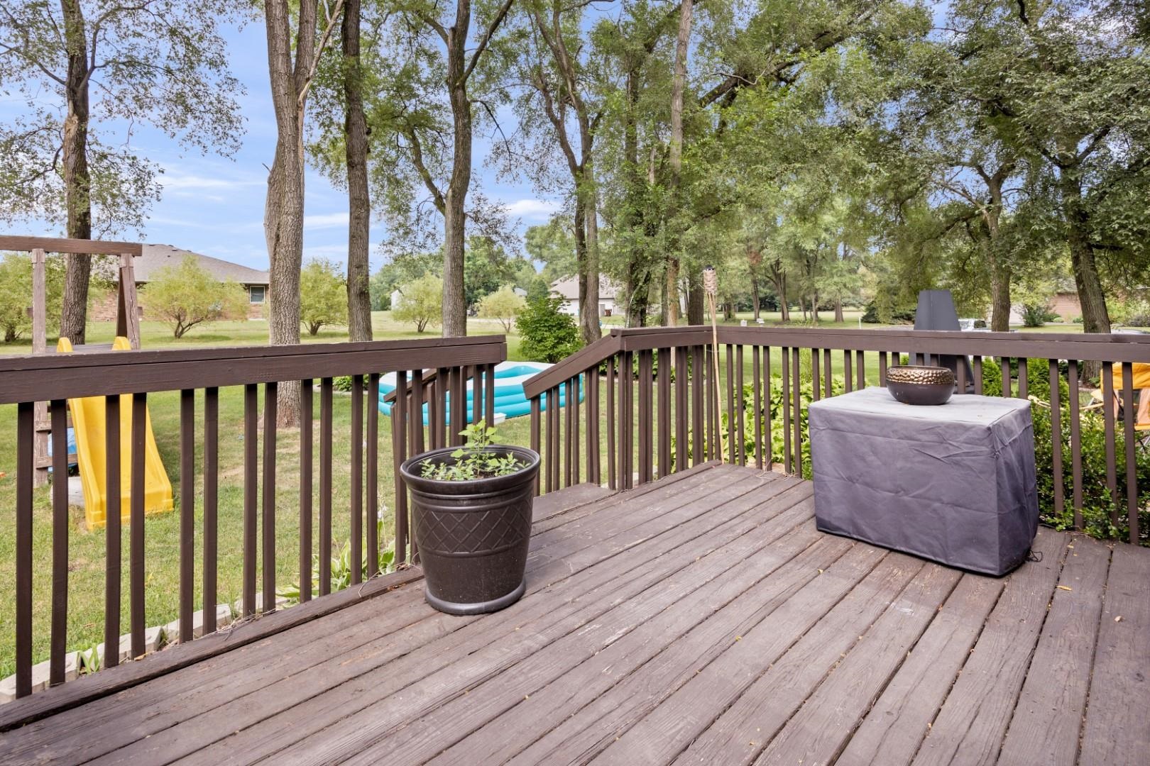 5568 Gray Eagle Road Roscoe, IL 61073 - Photo 36 of 45 a view of balcony with wooden floor and seating space
