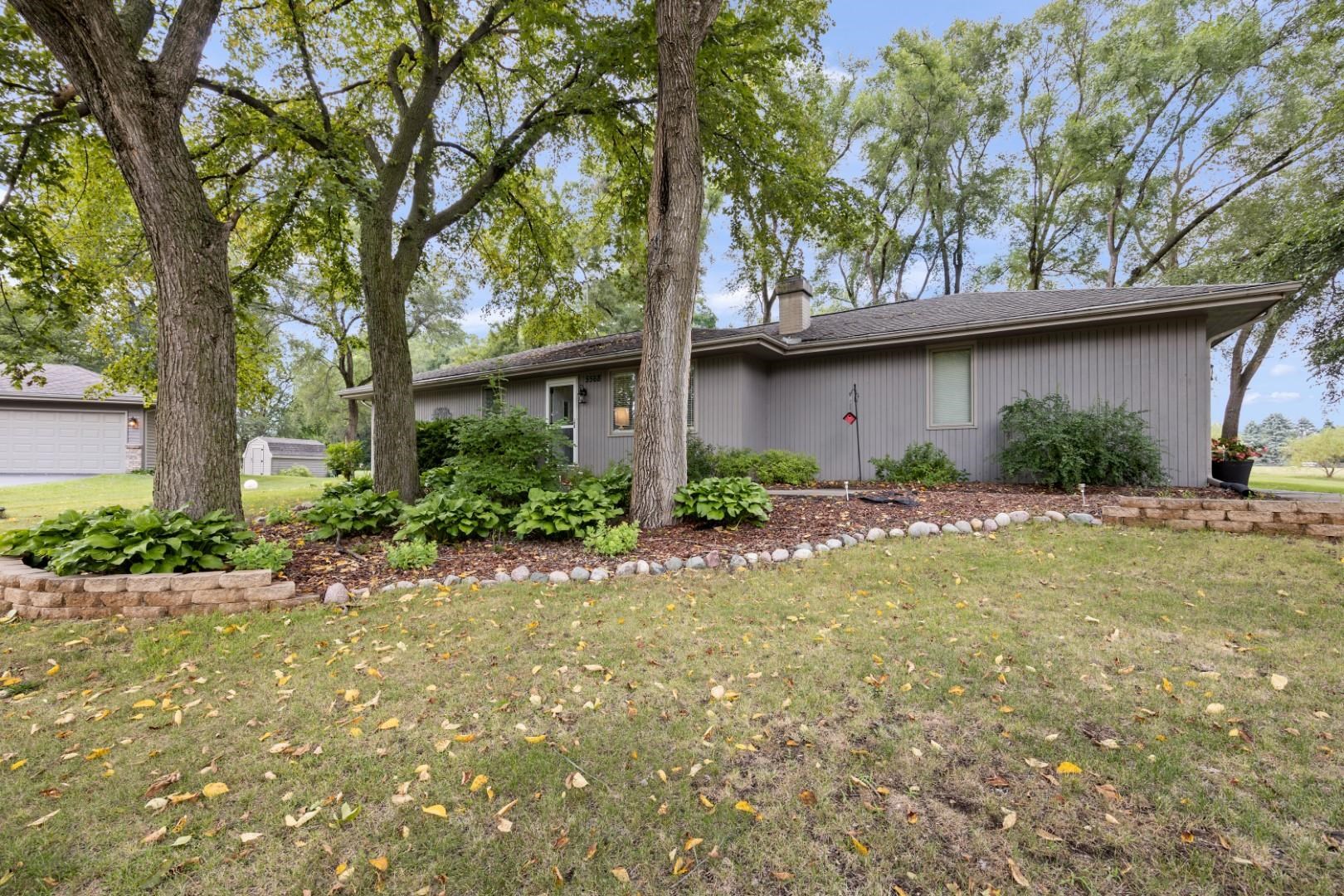 5568 Gray Eagle Road Roscoe, IL 61073 - Photo 42 of 45 a front view of a house with a yard