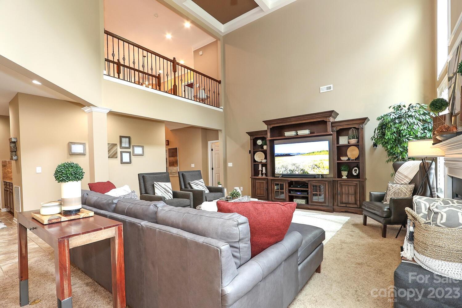 209 Fischer Road Fort Mill, SC 29715 - Photo 18 of 36 a living room with furniture and a flat screen tv