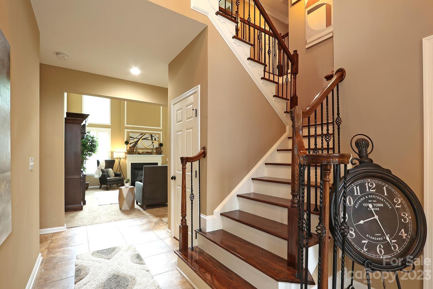 209 Fischer Road Fort Mill, SC 29715 - Photo 24 of 36 a view of entryway livingroom and hall