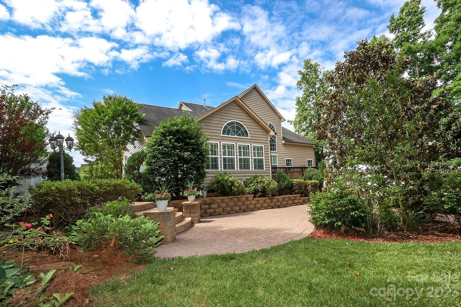209 Fischer Road Fort Mill, SC 29715 - Photo 30 of 36 a front view of a house with a yard