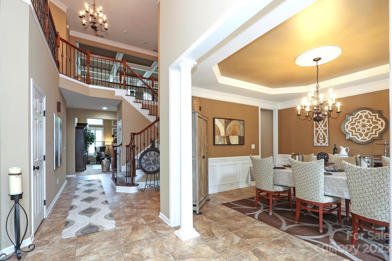 209 Fischer Road Fort Mill, SC 29715 - Photo 4 of 36 a view of a livingroom with a chandelier and furniture