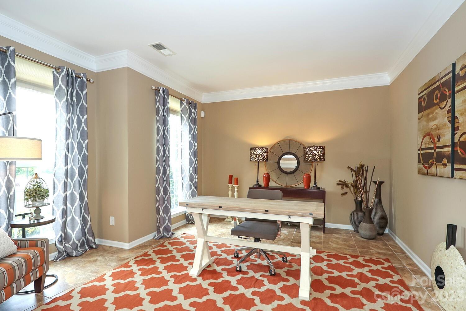 209 Fischer Road Fort Mill, SC 29715 - Photo 5 of 36 a living room with furniture and a rug