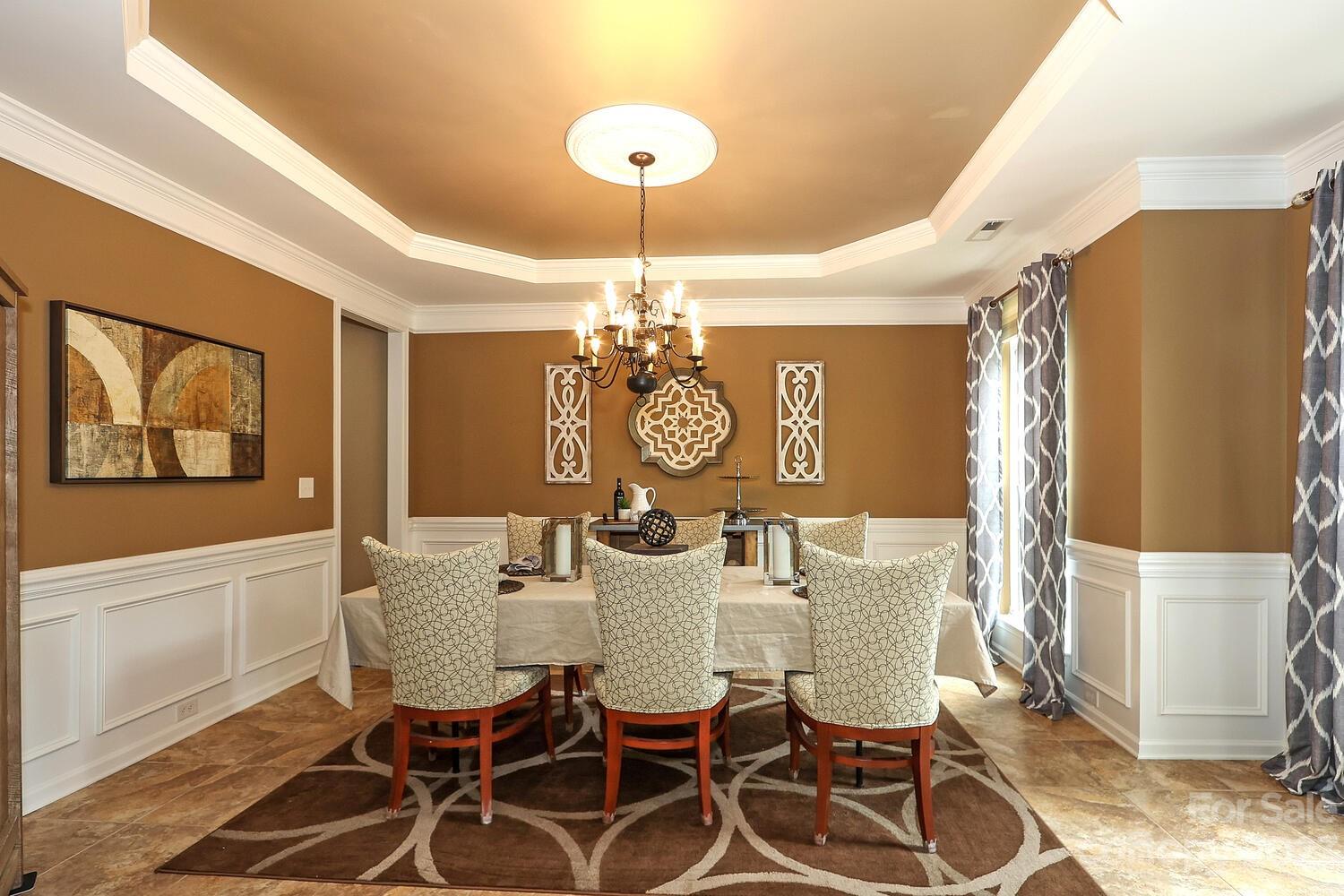 209 Fischer Road Fort Mill, SC 29715 - Photo 6 of 36 a view of a dining room with furniture and chandelier