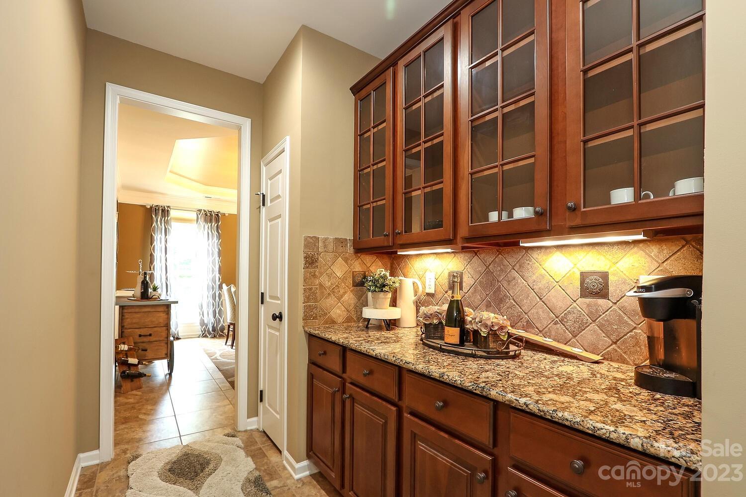 209 Fischer Road Fort Mill, SC 29715 - Photo 9 of 36 a kitchen with a sink and a window