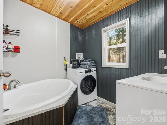 a utility room with dryer and washer