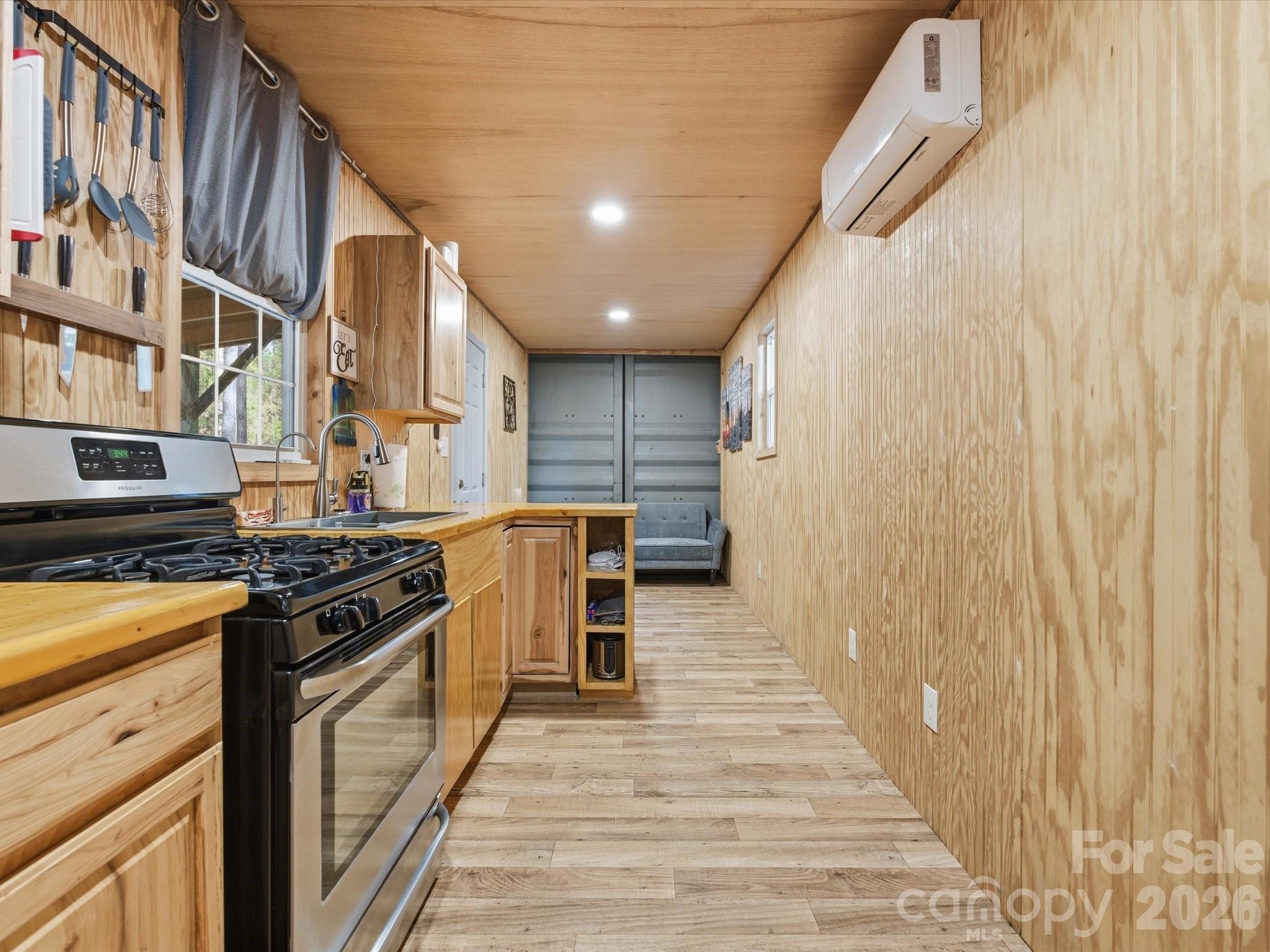 2704 Kee-Moore Drive Chester, SC 29706 - Photo 37 of 43 a kitchen with stainless steel appliances granite countertop a stove and a refrigerator