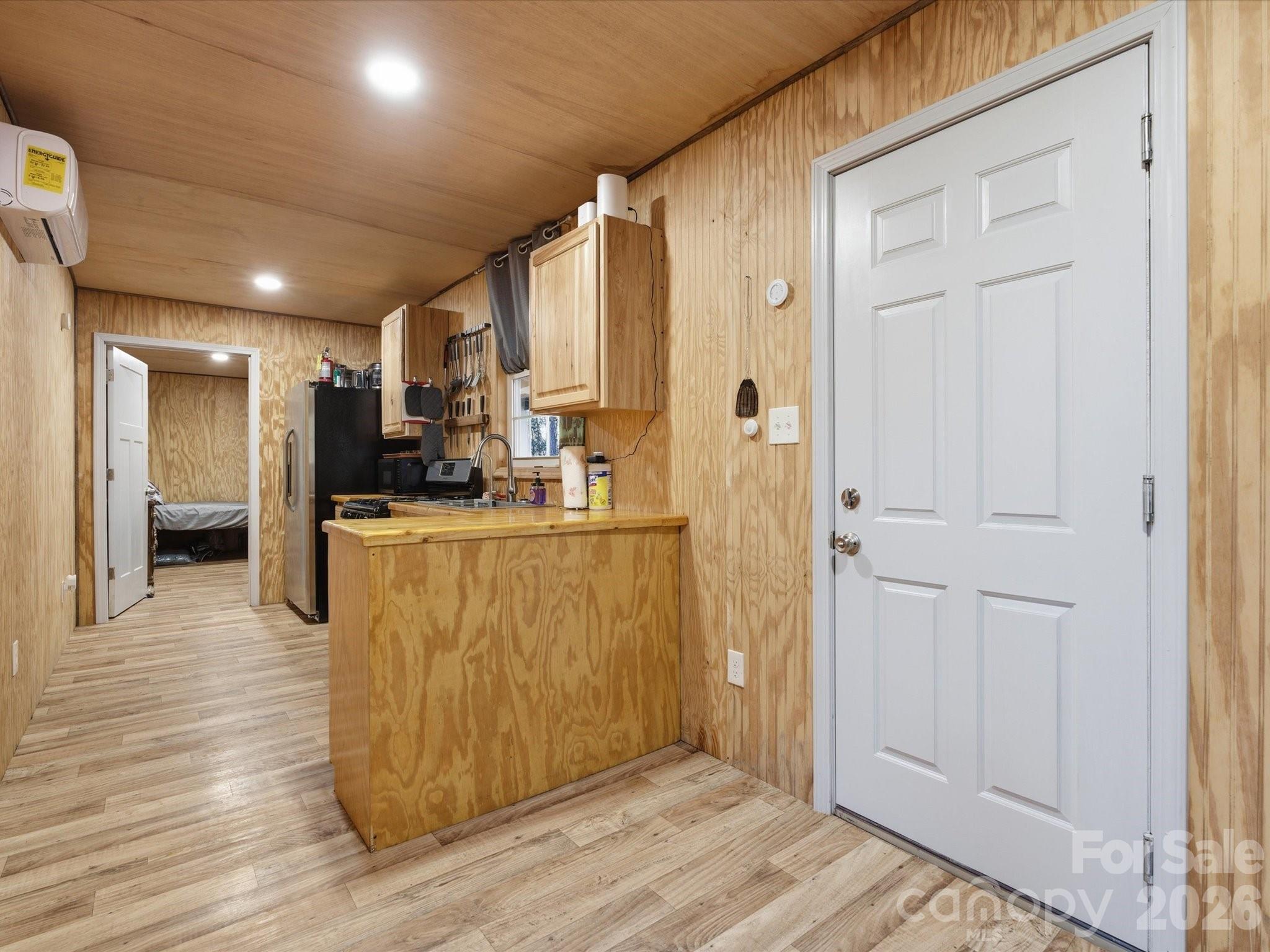 2704 Kee-Moore Drive Chester, SC 29706 - Photo 40 of 43 a view of a kitchen with kitchen island wooden floor entryway