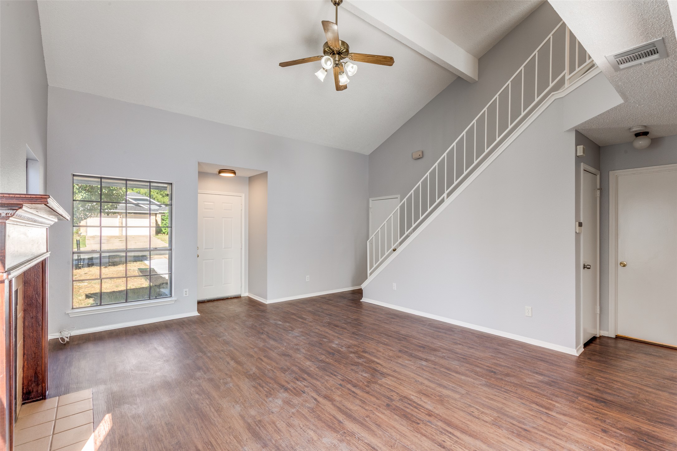 12323 Little Emily Way Austin, TX 78753 - Photo 2 of 24 wooden floor in an empty room with a window