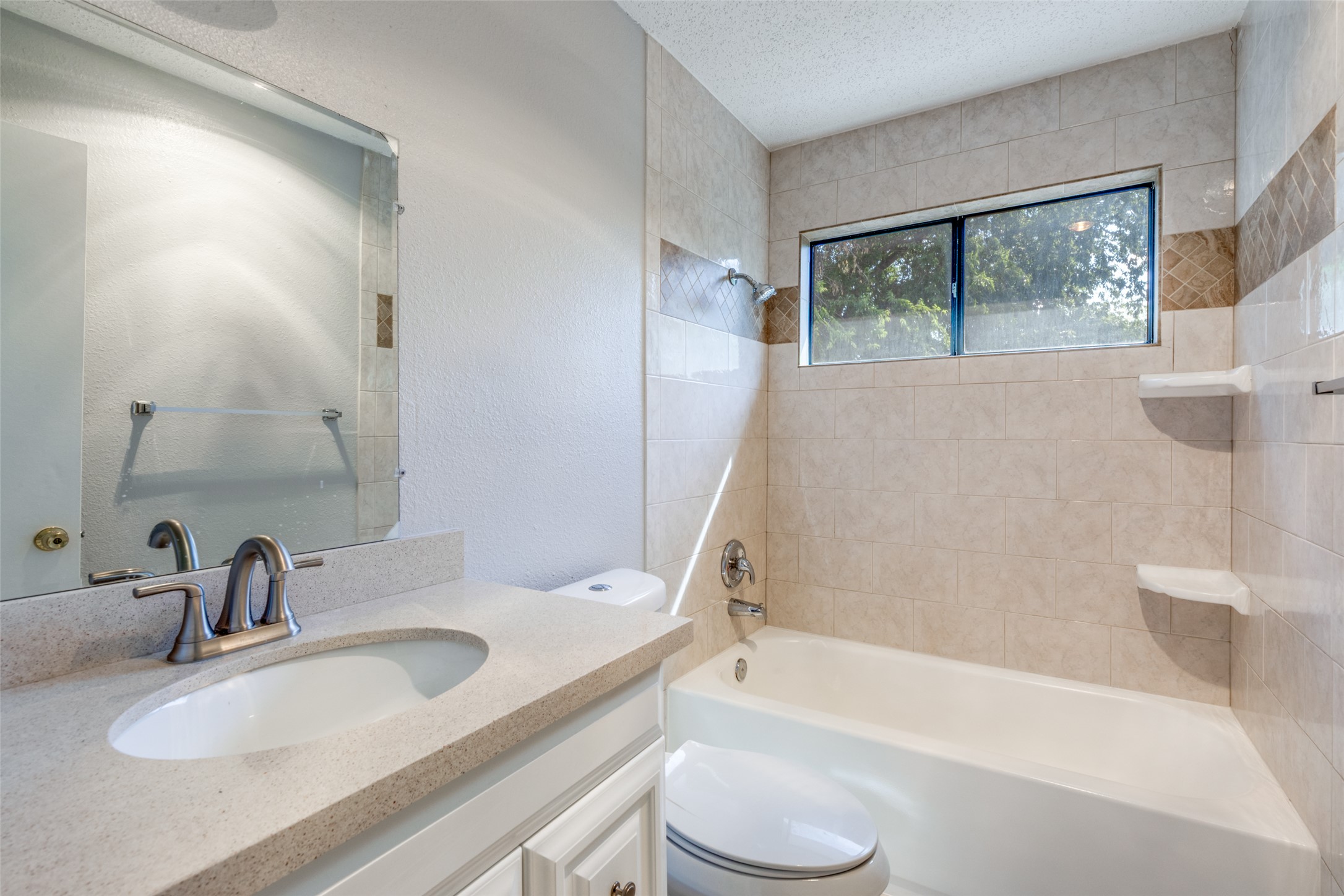 12323 Little Emily Way Austin, TX 78753 - Photo 21 of 24 a bathroom with a granite countertop sink toilet and bathtub
