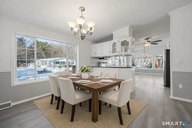 a bathroom with a sink double vanity and a mirror