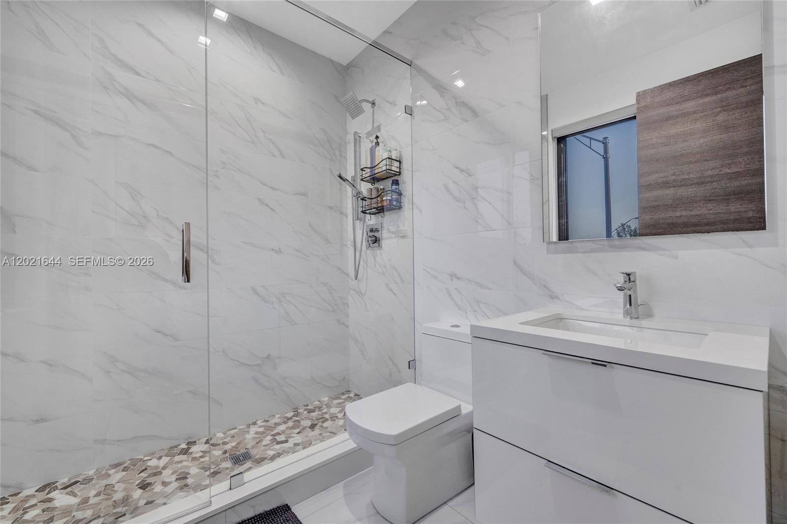 7800 Southwest 9th Terrace Miami, FL 33144 - Photo 53 of 64 a bathroom with a sink a toilet and shower