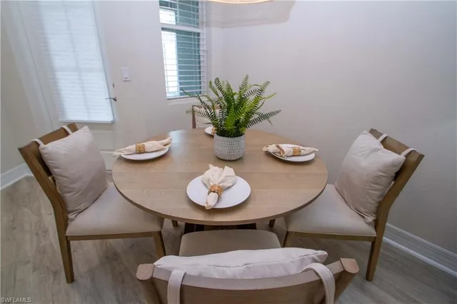 a vase of flowers sitting on a table