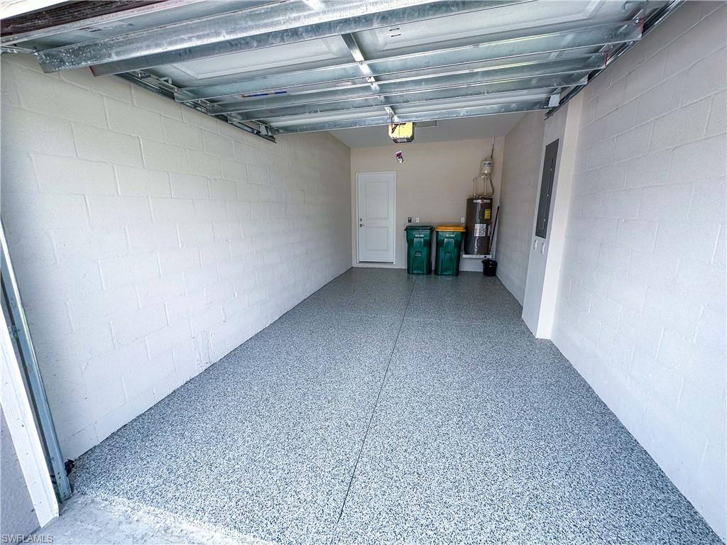 268 Indies Drive East, Unit 102 Naples, FL 34114 - Photo 39 of 48 a view of a room with a hallway
