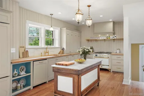 a view of a kitchen with a sink cabinet and a living room