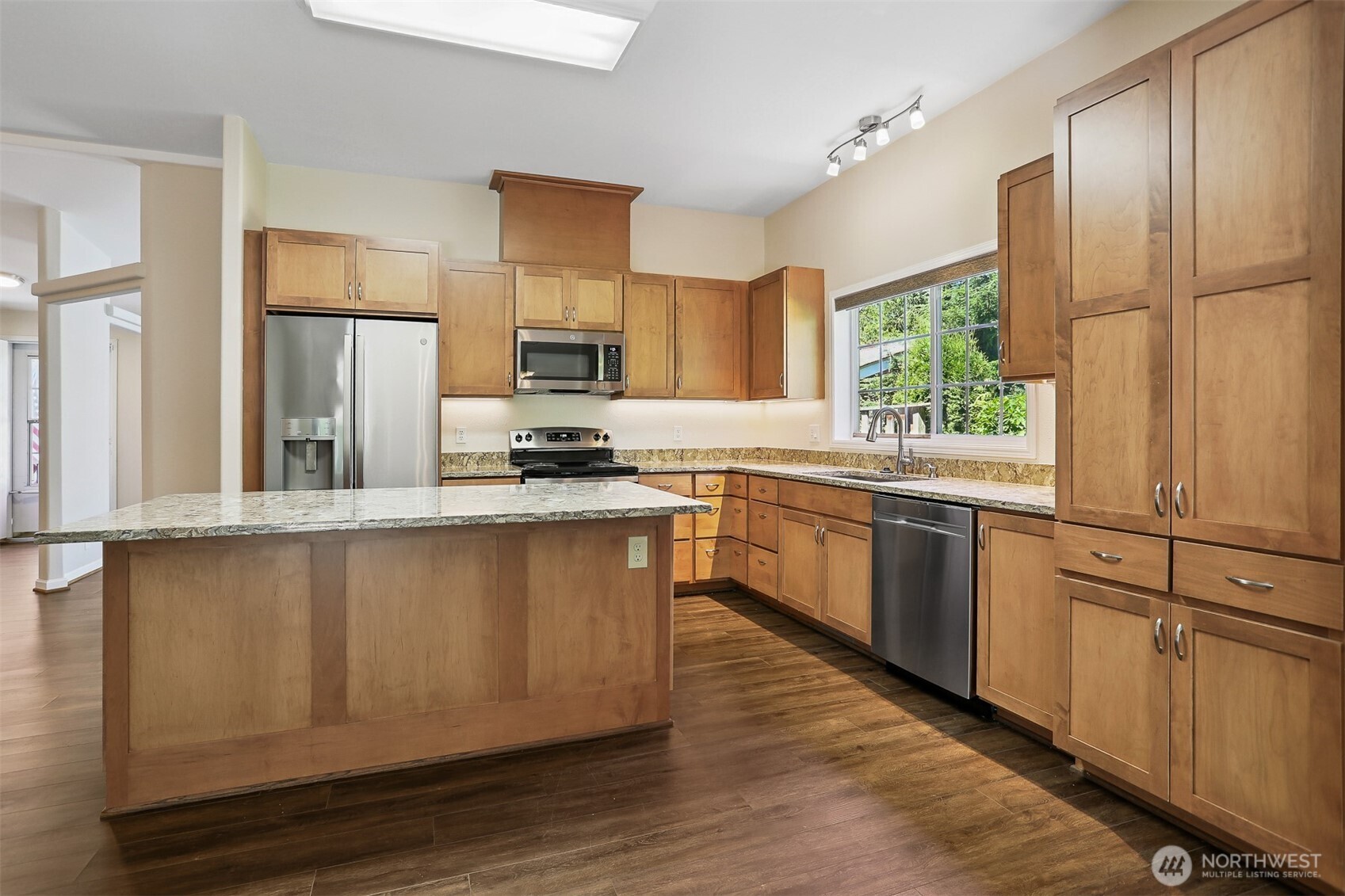 23701 9th Place West Bothell, WA 98021 - Photo 3 of 40 a kitchen with a refrigerator stove and sink