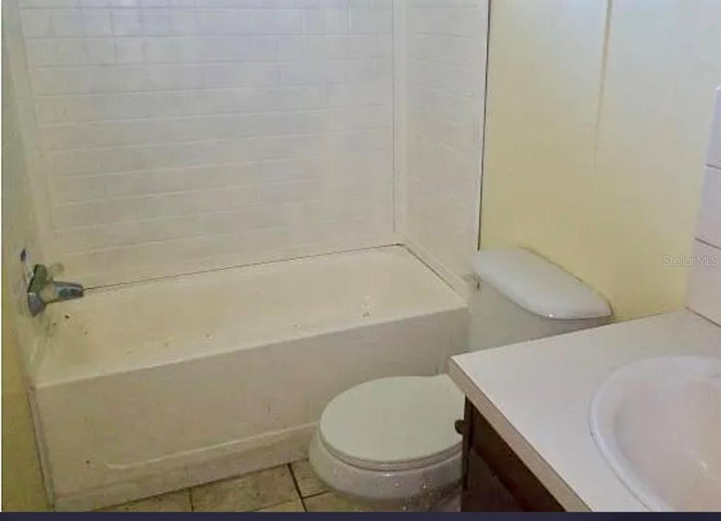 11475 167th Road Live Oak, FL 32060 - Photo 15 of 15 a bathroom with a sink and toilet