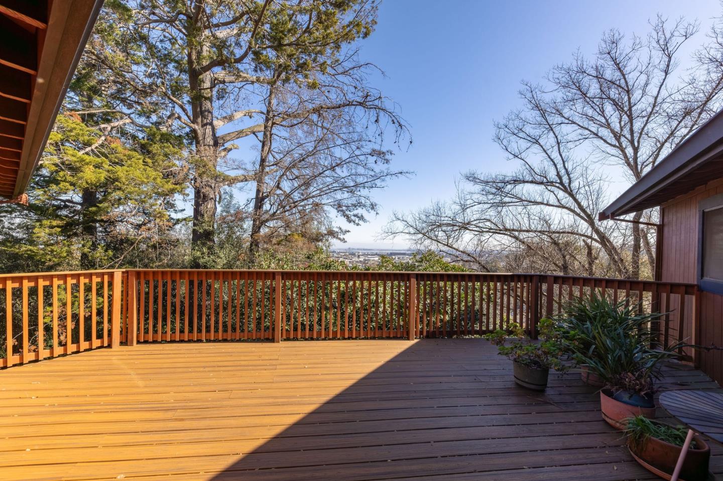 917 Holly Road Belmont, CA 94002 - Photo 15 of 82 a view of balcony with wooden floor and fence