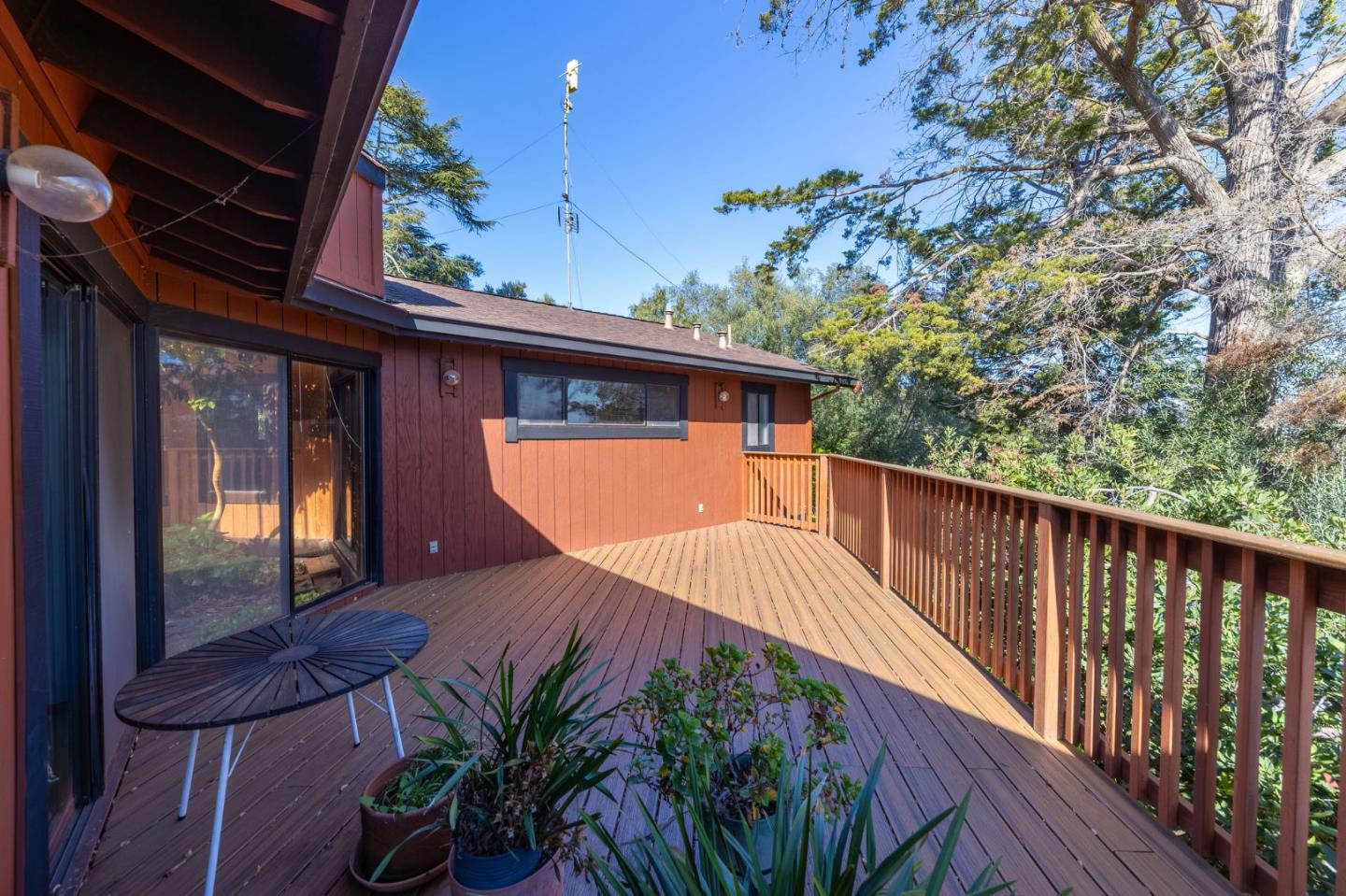 917 Holly Road Belmont, CA 94002 - Photo 17 of 82 a view of a house with backyard and deck