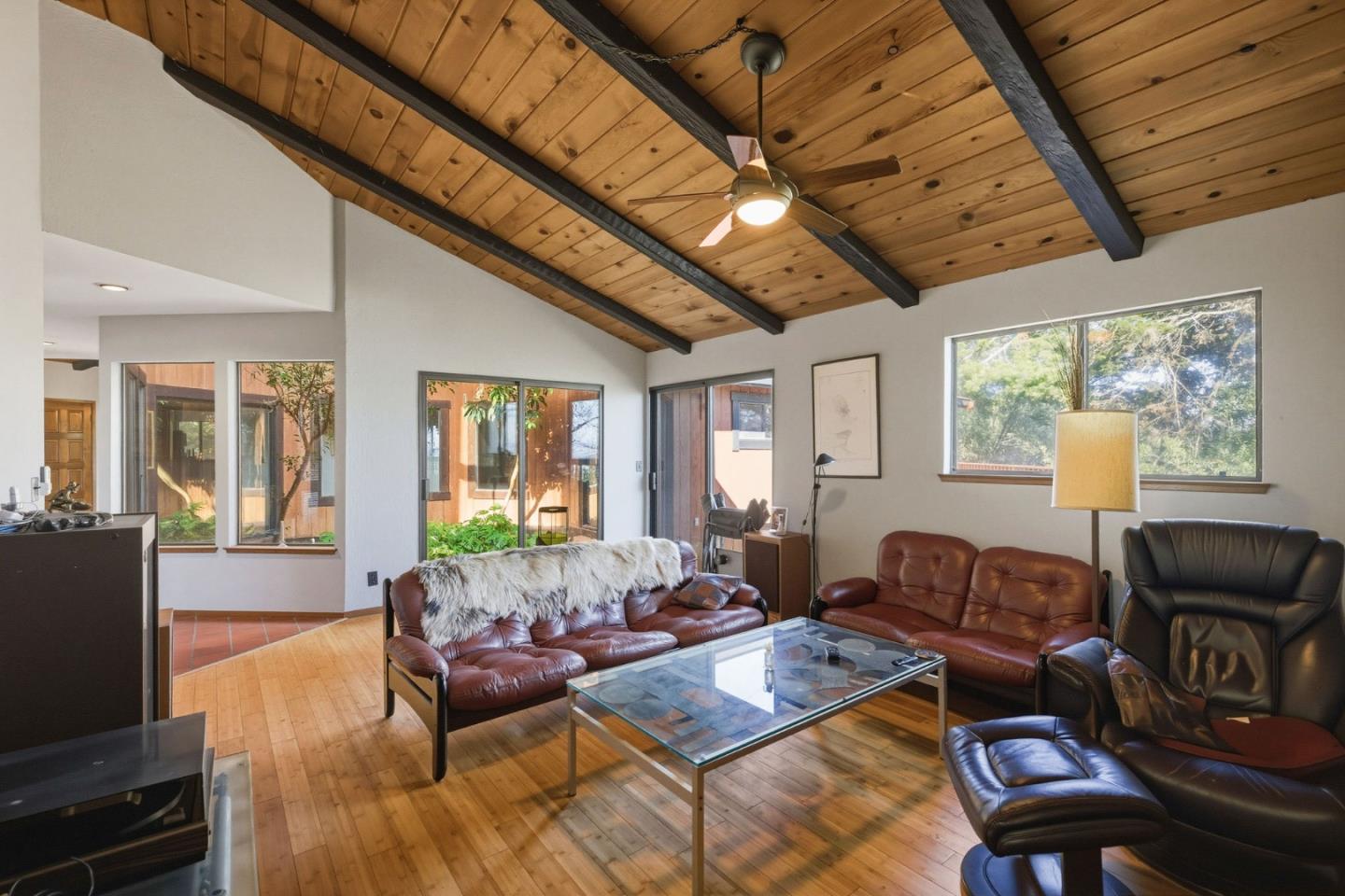 917 Holly Road Belmont, CA 94002 - Photo 20 of 82 a living room with furniture and a flat screen tv
