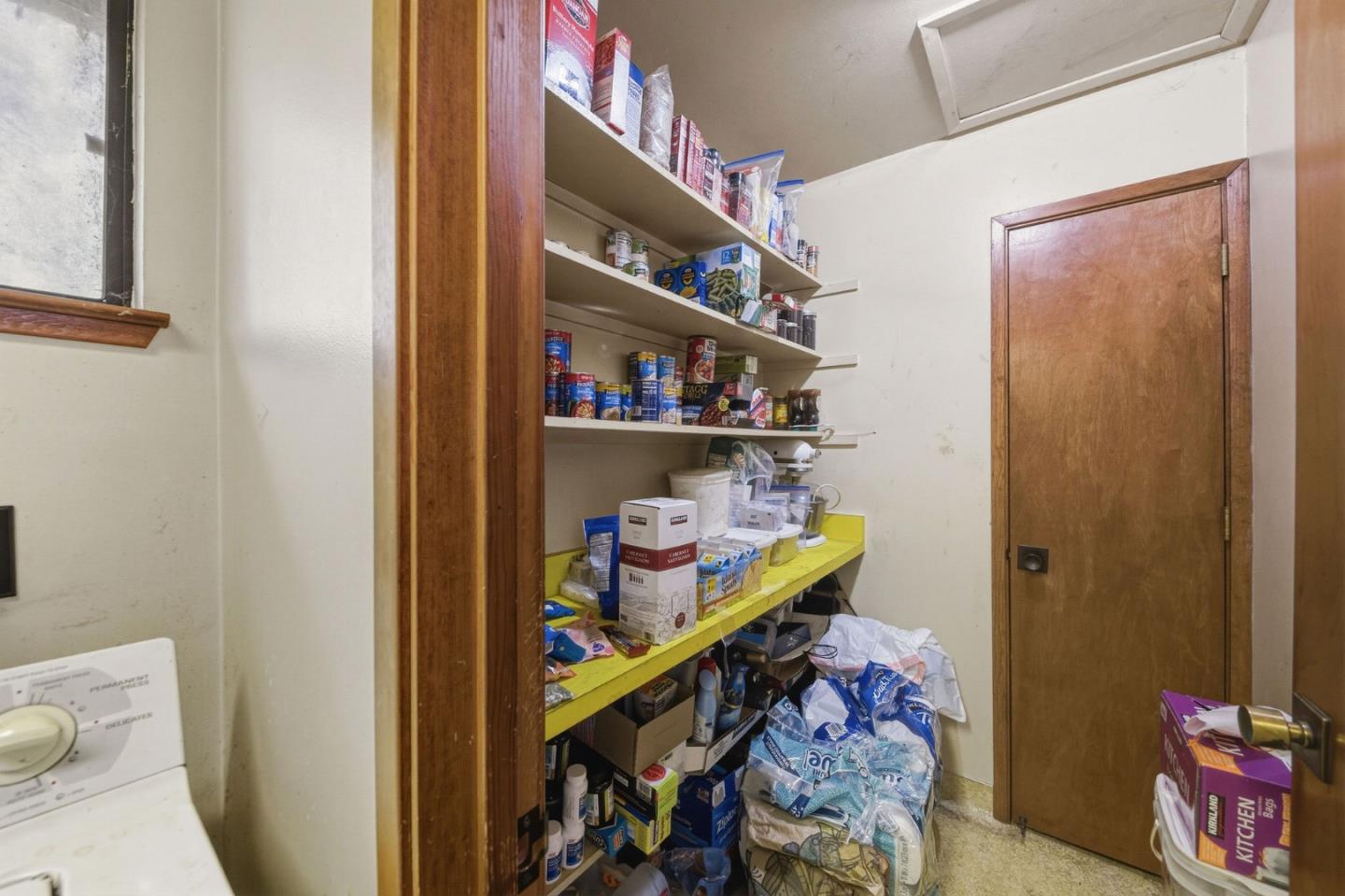 917 Holly Road Belmont, CA 94002 - Photo 48 of 82 a room with lots of different colored cloths