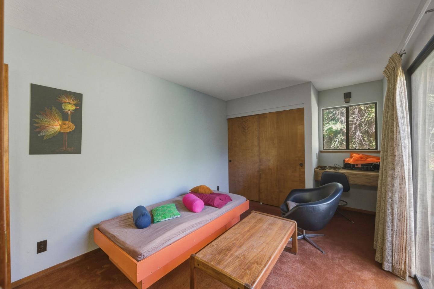 917 Holly Road Belmont, CA 94002 - Photo 59 of 82 a living room with furniture and a window