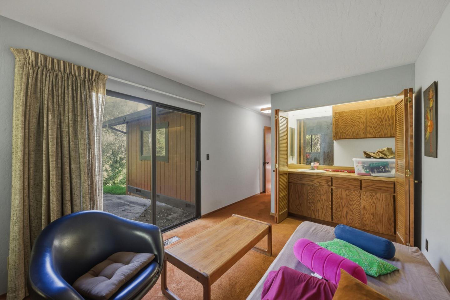 917 Holly Road Belmont, CA 94002 - Photo 64 of 82 a room with furniture and a window