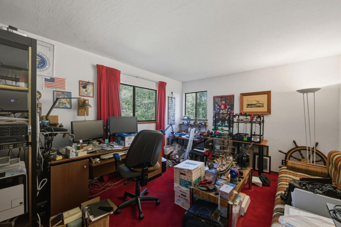 917 Holly Road Belmont, CA 94002 - Photo 66 of 82 a view of a workspace with furniture and a window