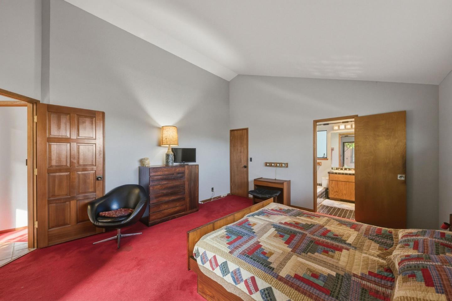 917 Holly Road Belmont, CA 94002 - Photo 69 of 82 a bedroom with a bed and furniture