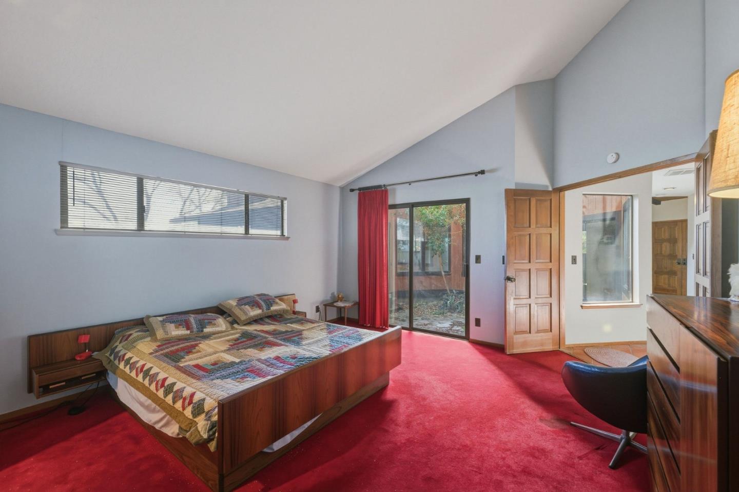 917 Holly Road Belmont, CA 94002 - Photo 72 of 82 a bed sitting in a room next to a window