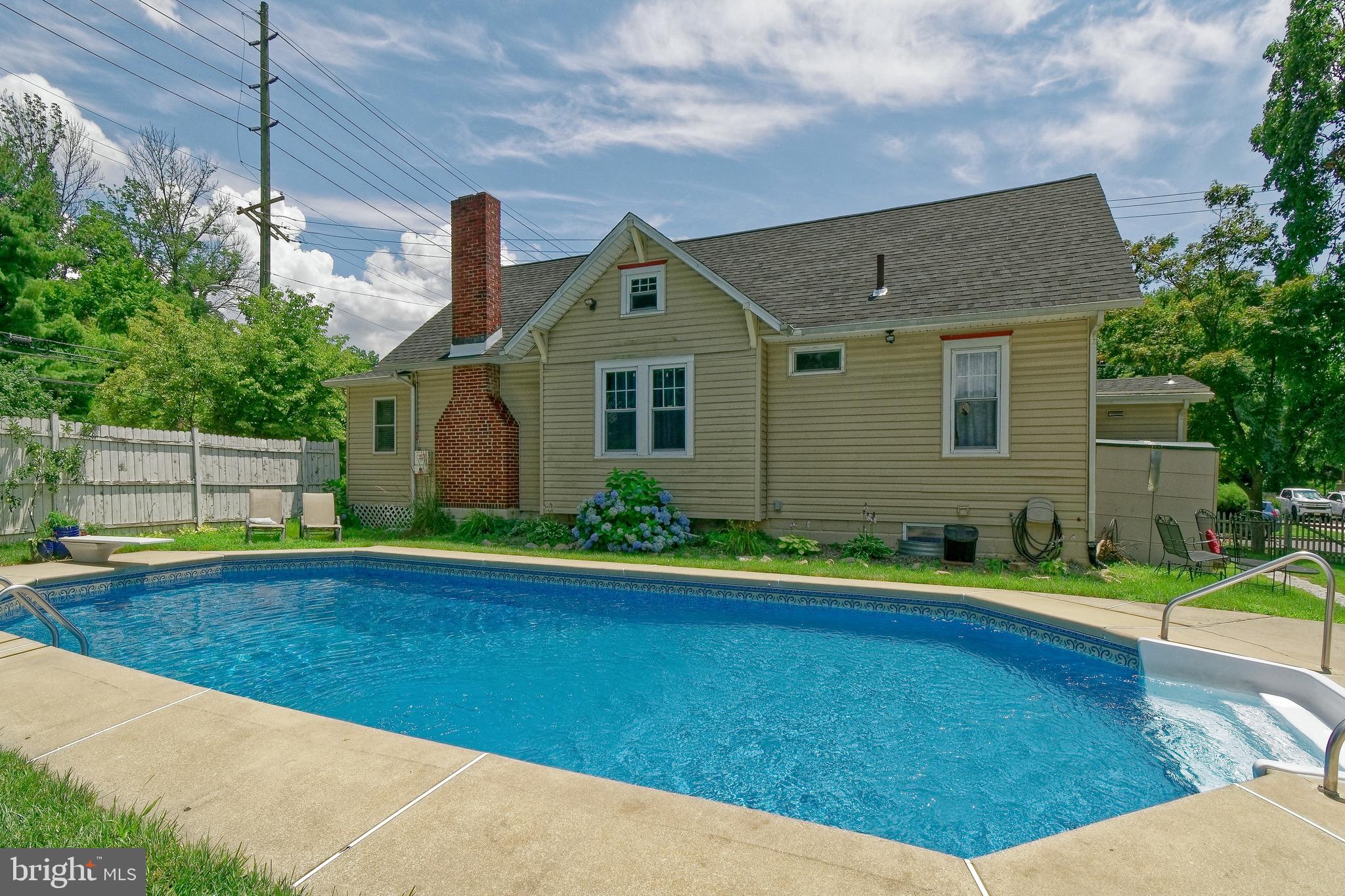 300 North Woodbury Road Pitman, NJ 08071 - Photo 1 of 33 Side view exterior and in ground pool