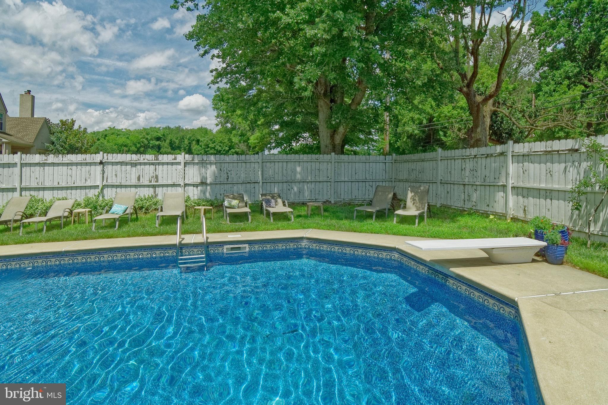 300 North Woodbury Road Pitman, NJ 08071 - Photo 31 of 33 In ground pool and diving board