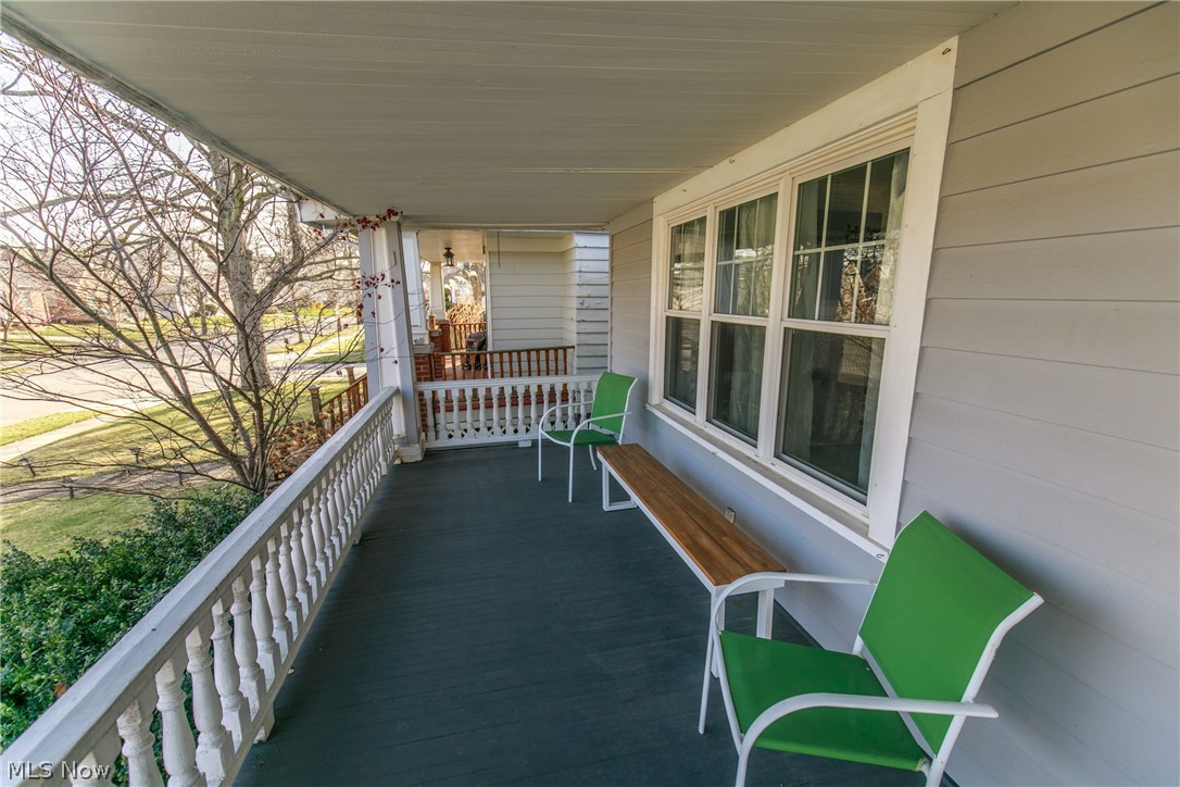 3516 Attica Road Cleveland, OH 44111 - Photo 2 of 27 Front porch provides a welcoming space for entertaining guests and family
