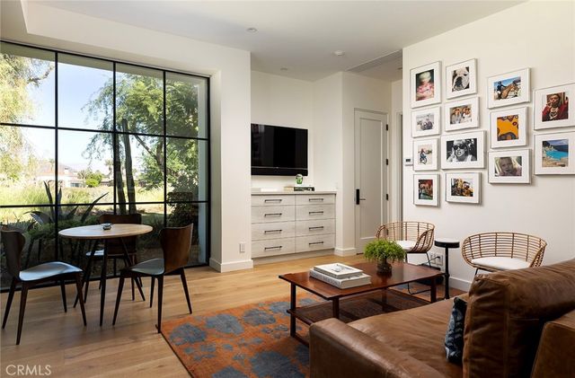 a bathroom with double vanity sinks and a mirror