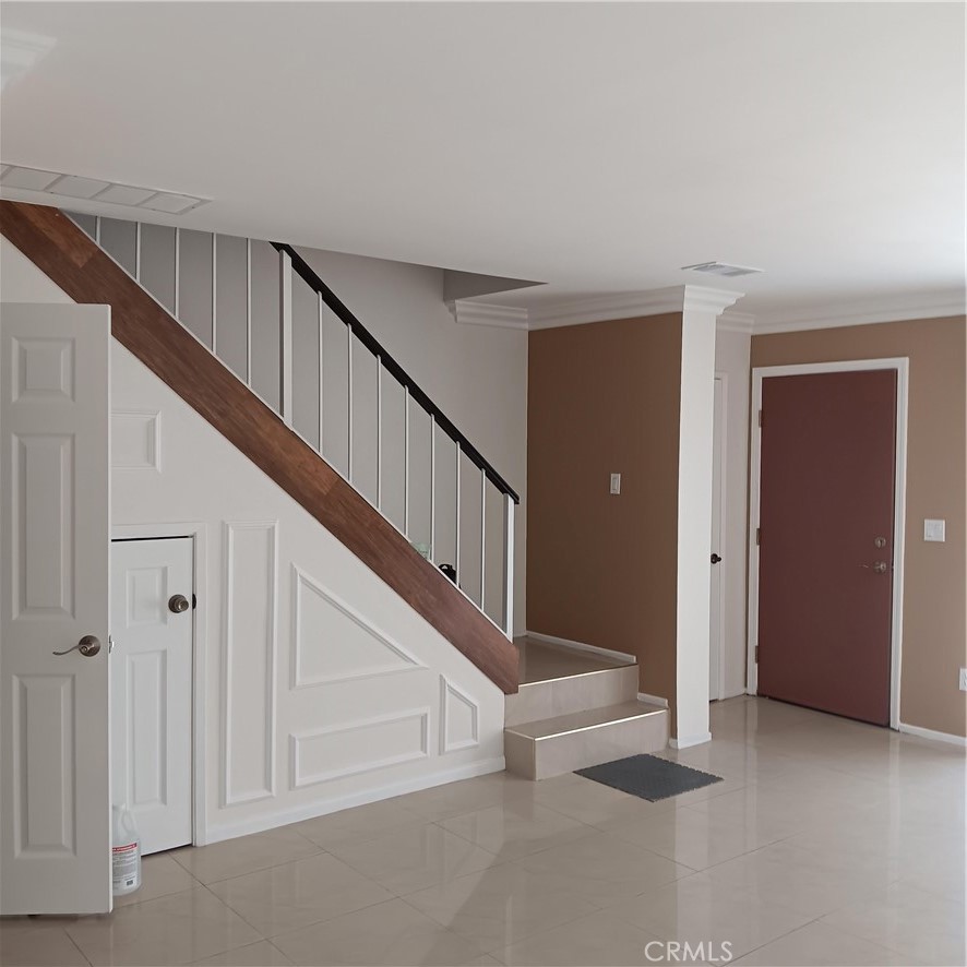 1419 West 179th Street, Unit 16 Gardena, CA 90248 - Photo 15 of 48 a view of an entryway with staircase