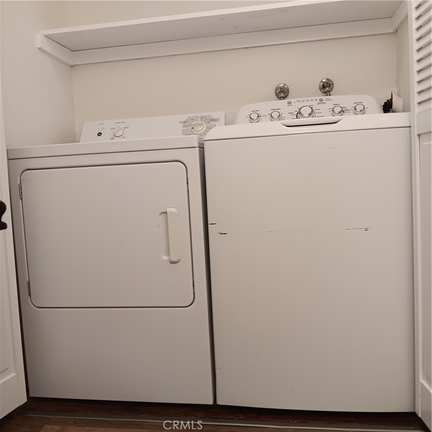 1419 West 179th Street, Unit 16 Gardena, CA 90248 - Photo 22 of 48 a utility room with dryer and washer