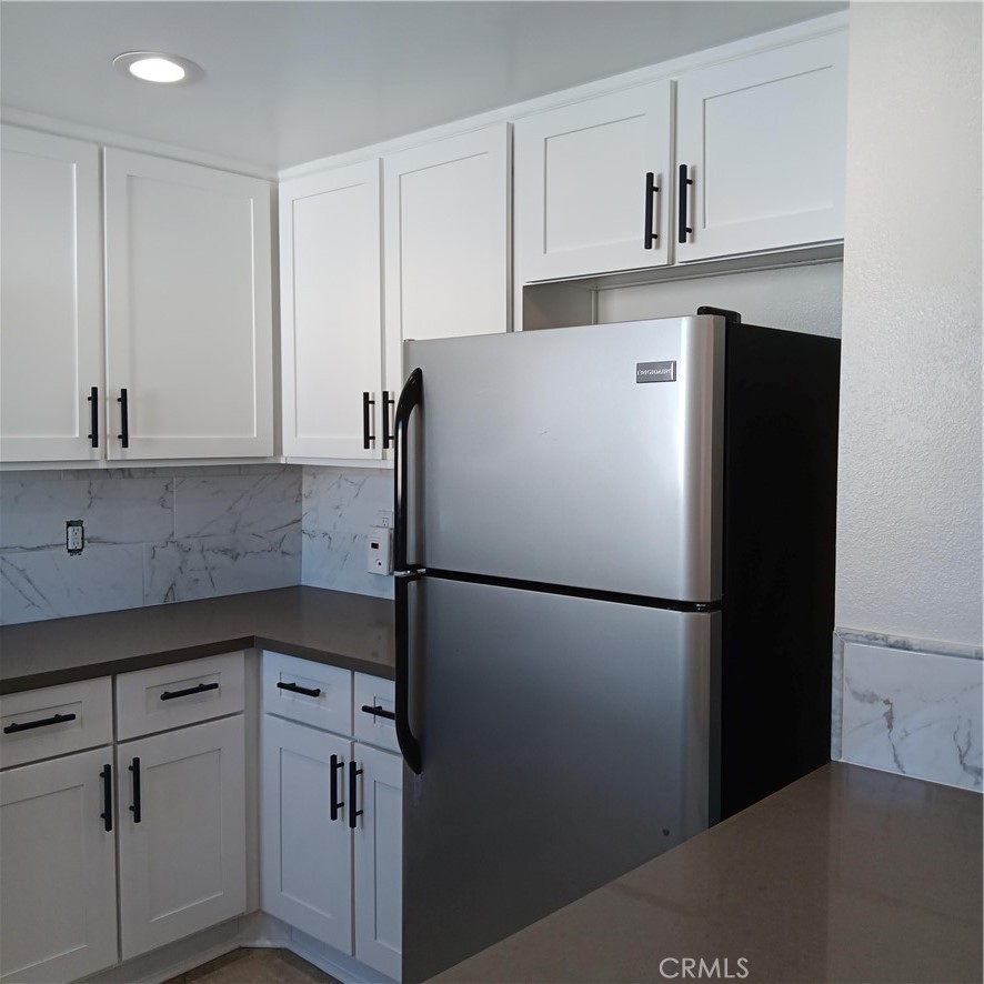 1419 West 179th Street, Unit 16 Gardena, CA 90248 - Photo 3 of 48 a white refrigerator freezer sitting in a kitchen