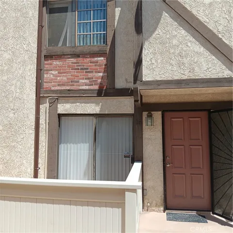 a view of a door and wooden door