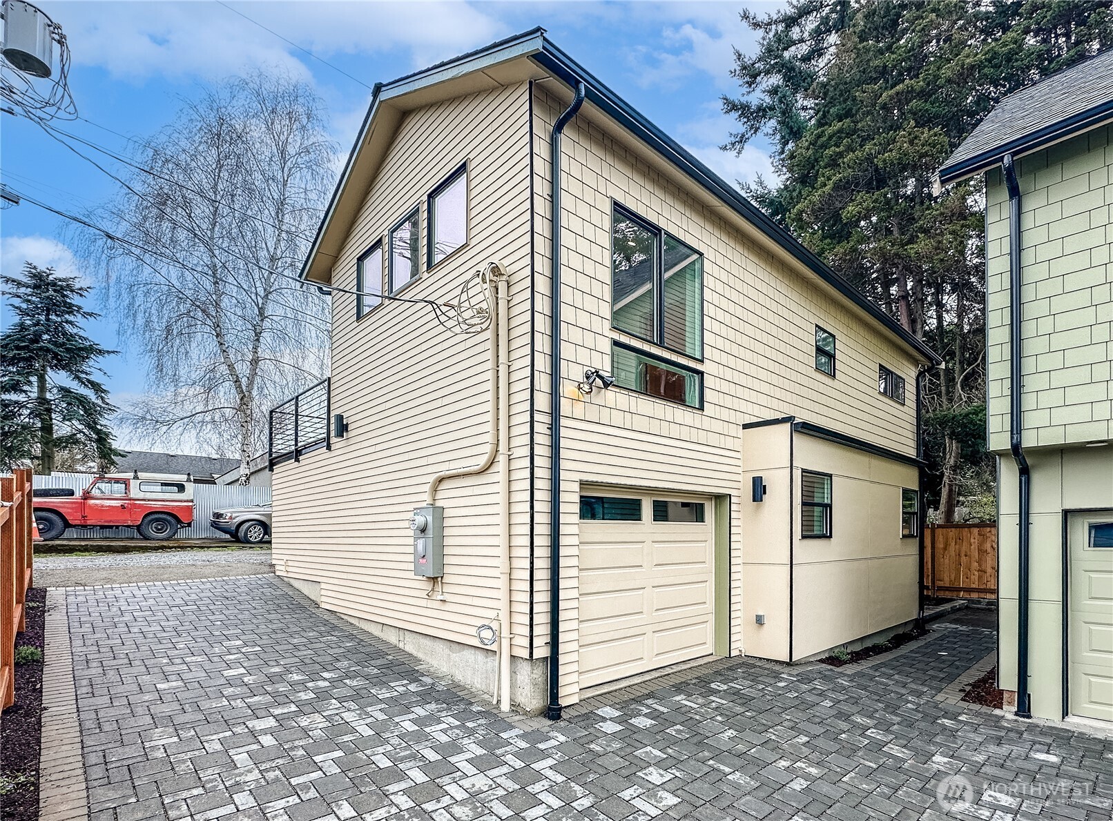 3412 Northwest 56th Street Seattle, WA 98107 - Photo 1 of 26 a view of a white house with a small space
