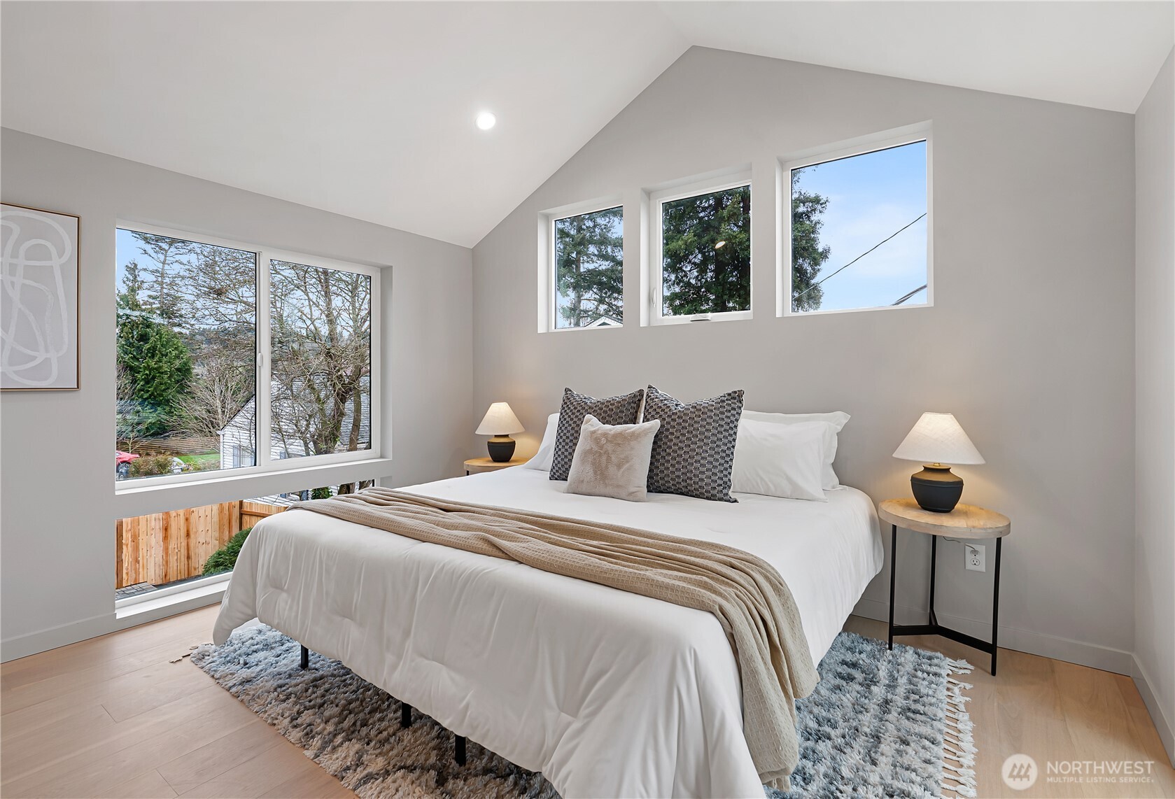 3412 Northwest 56th Street Seattle, WA 98107 - Photo 14 of 26 a bedroom with bed and a large window