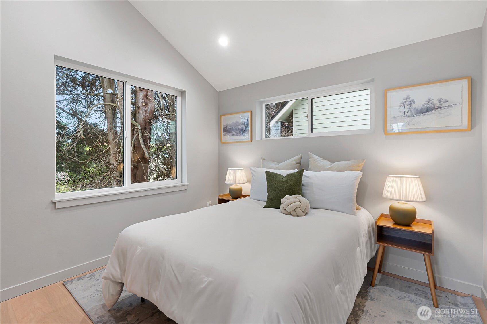 3412 Northwest 56th Street Seattle, WA 98107 - Photo 21 of 26 a bedroom with a bed and a window