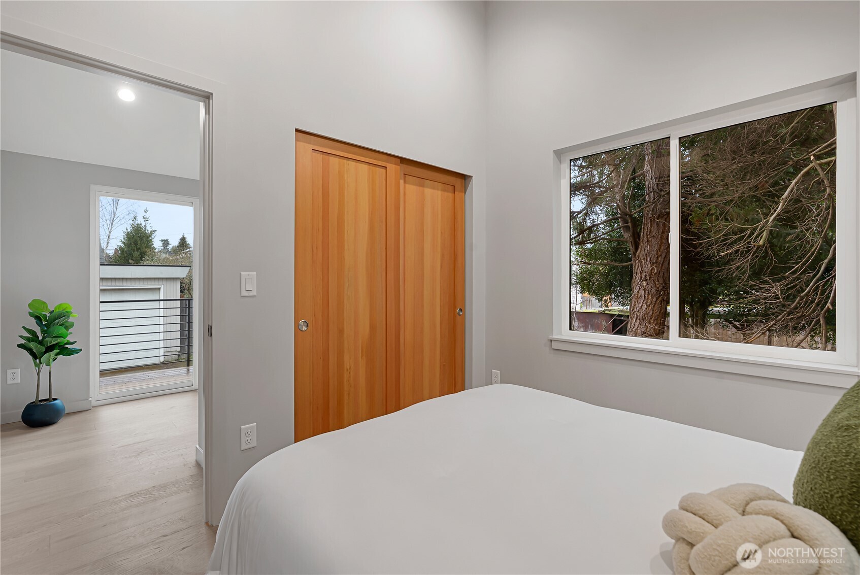 3412 Northwest 56th Street Seattle, WA 98107 - Photo 22 of 26 a bedroom with a bed and a window