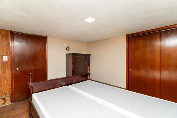 a view of a livingroom with furniture and a flat screen tv