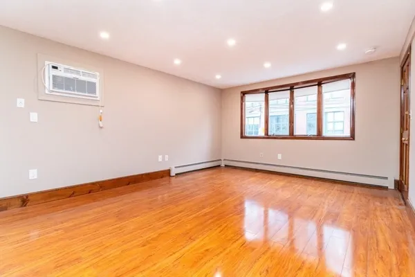 a view of a kitchen with a sink and a stove top oven