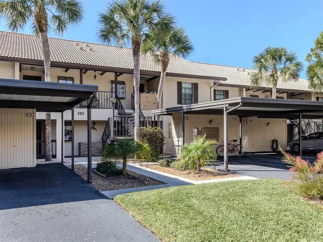 front view of a house with a swimming pool