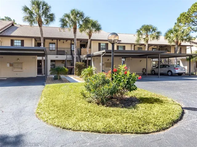 a view of a house with fountain bath tub and chairs