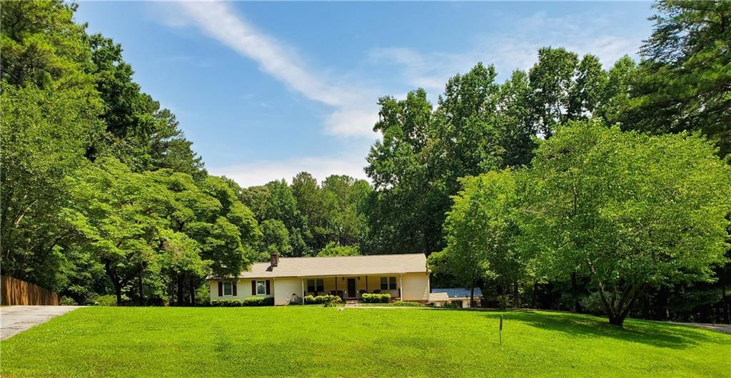 465 Dobbs Road Woodstock, GA 30188 - Photo 1 of 1 Large front yard with circular driveway. View from the street